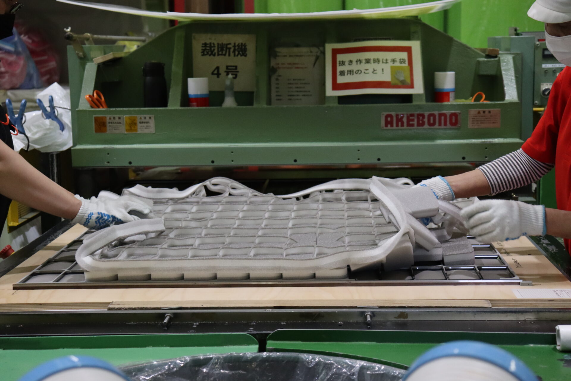 Die-cutting machine punching custom shapes from foam
