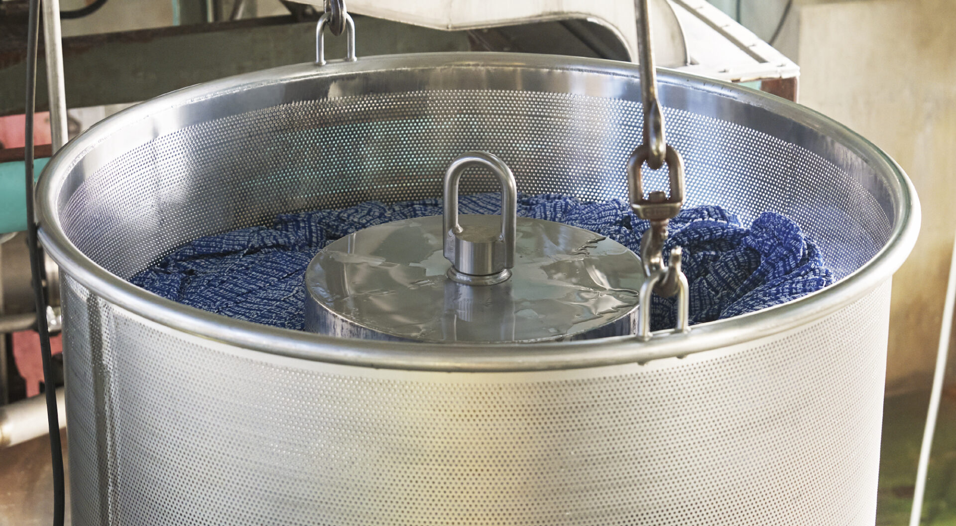 Japanese body towel fabric being dyed in an industrial dyeing vat