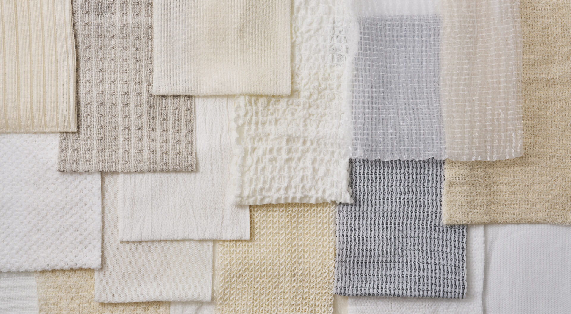 Range of Japanese body towel fabric swatches in different weaves and textures
