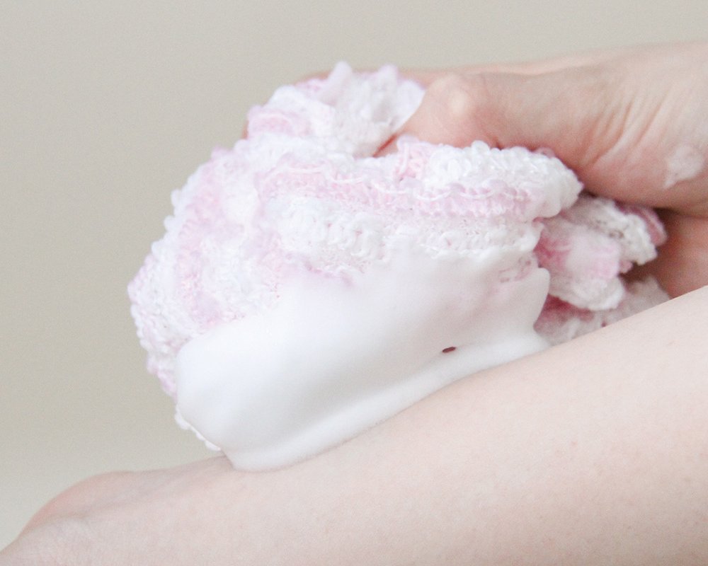 Lathering an Aisen body towel